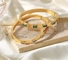 Ouro da pulseira do bracelete da amizade do amor de 18 K com o presente articulado pedras do zirconita
